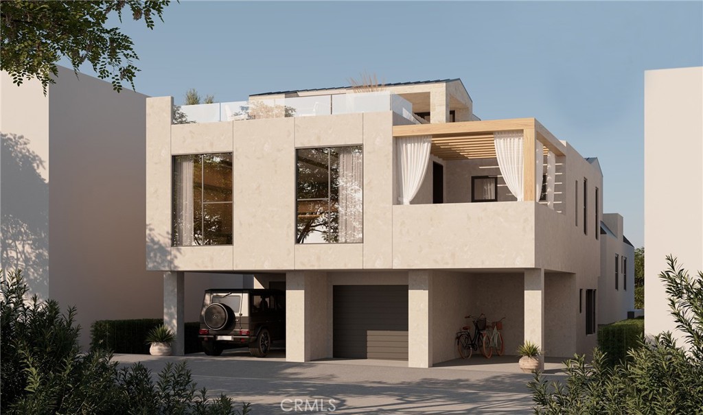 Rear of structure. Front unit garage and carport - 407 Heliotrope Avenue A, Corona Del Mar CA 92625 - photo 3