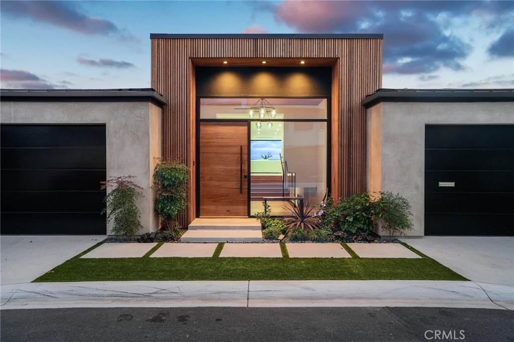 Frameless Solid Mahogany wood entry 8 ft door with sleek black pull bar handle - 452 Mendoza Terrace, Corona Del Mar CA 92625 - photo 1