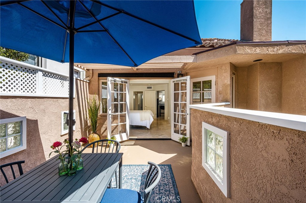 seamlessly flowing from the primary bedroom - 506 1/2 Acacia, Corona Del Mar CA 92625 - photo 13