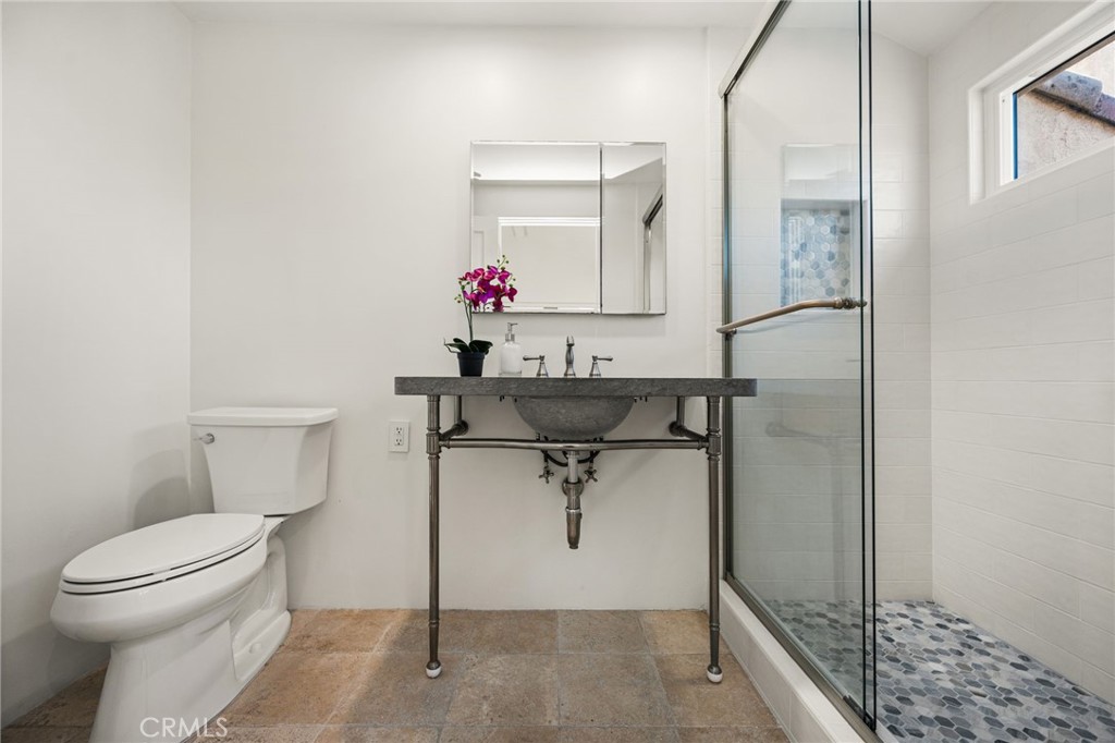 walk-in shower features a full-height tile surround - 506 1/2 Acacia, Corona Del Mar CA 92625 - photo 31