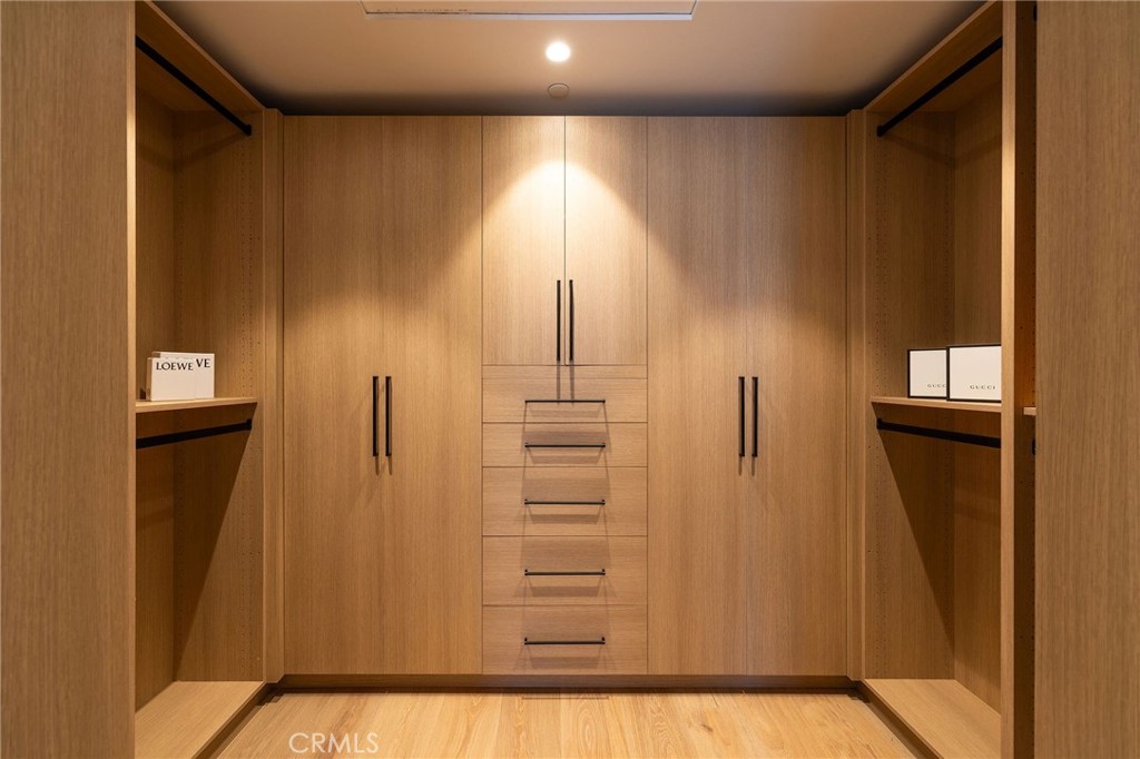 Main Floor Primary Closet - 53 Montecito Drive, Corona Del Mar CA 92625 - photo 56