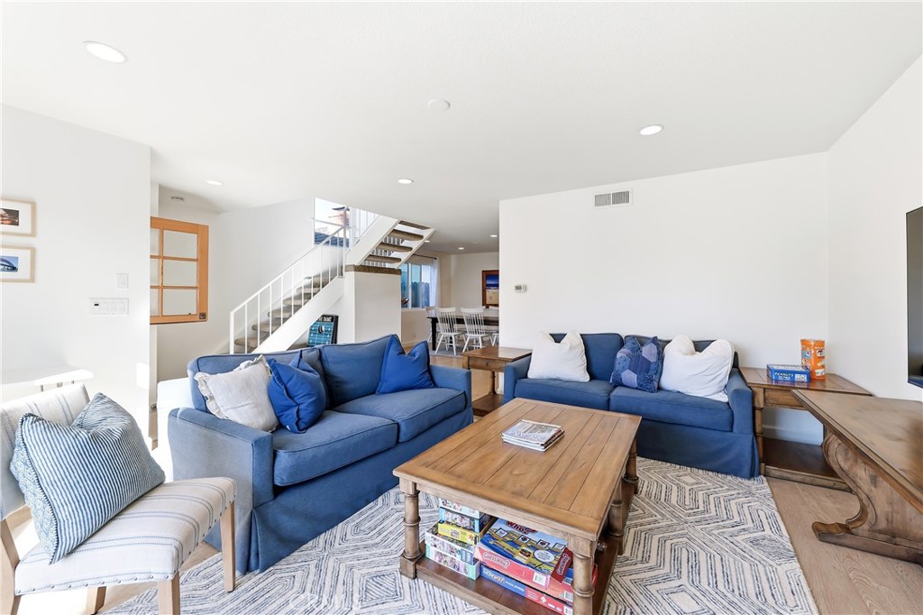 The living room/family room in both units are sunny, bright and spacious with french doors leading out to the front pati - 602 602.5 Marguerite 2, Corona Del Mar CA 92625 - photo 5