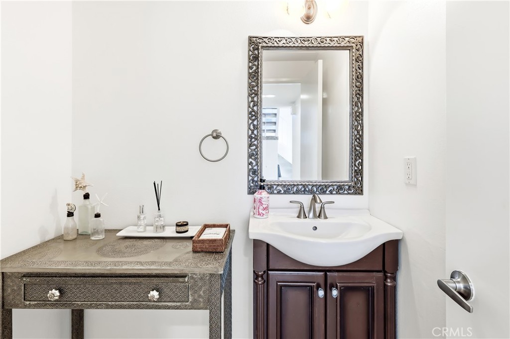 The half bath is on the first floor of both units... - 602 602.5 Marguerite 2, Corona Del Mar CA 92625 - photo 7