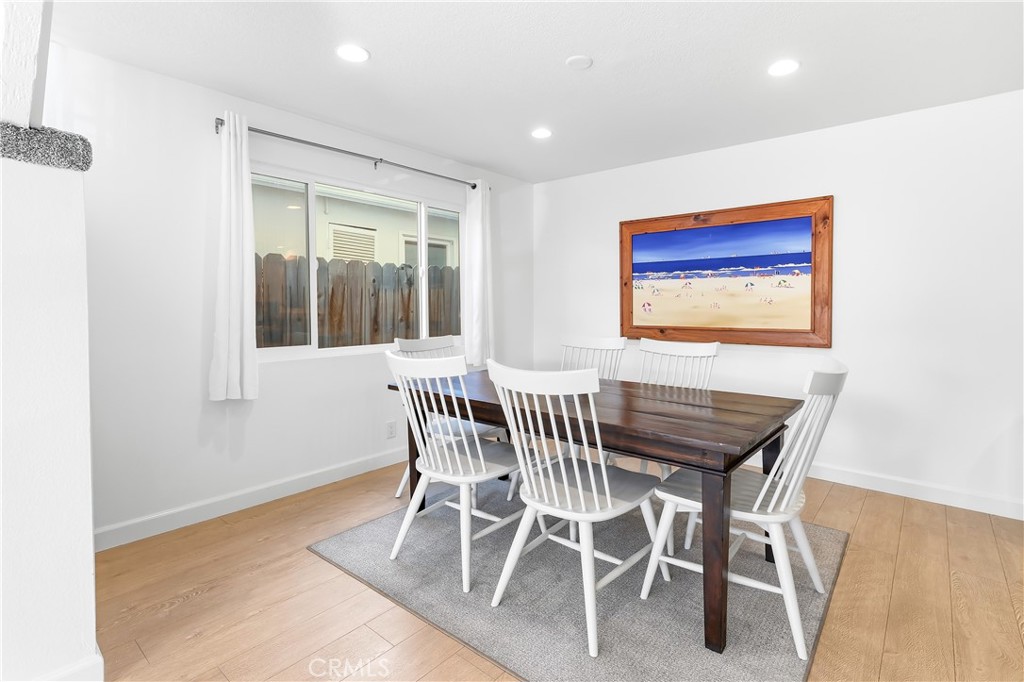 A very spacious dining room is located right off the kitchen in both units, this front unit is including the dining tabl - 602 602.5 Marguerite 2, Corona Del Mar CA 92625 - photo 8