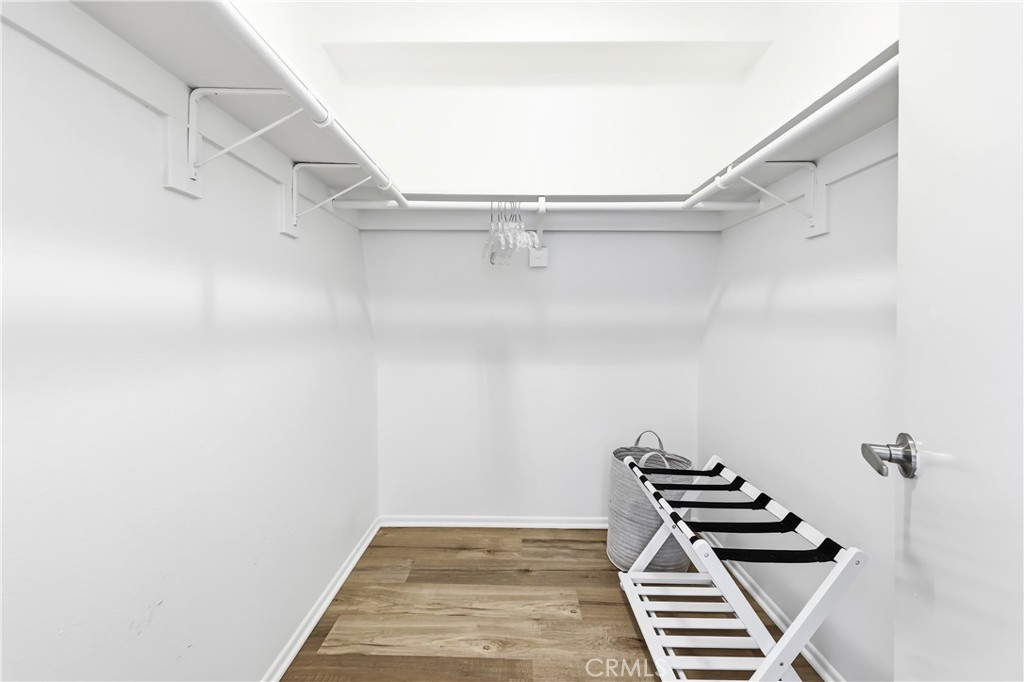This is the spacious walk-in closet in the primary suite. - 602 602.5 Marguerite 2, Corona Del Mar CA 92625 - photo 15