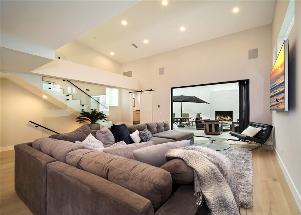 LIVING ROOM OPENS TO DECK WITH FIREPLACE - 603 1/2 Iris Avenue B, Corona Del Mar CA 92625 - photo 1