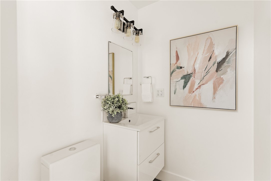 Half Bathroom in Living Room - 702 1/2 Acacia Avenue, Corona Del Mar CA 92625 - photo 7