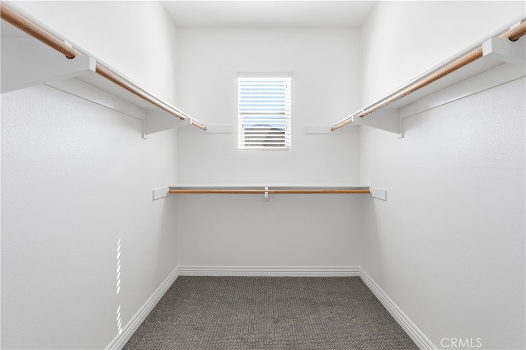 large walk in closet - 1044 Palmetto, Costa Mesa CA 92626 - photo 18
