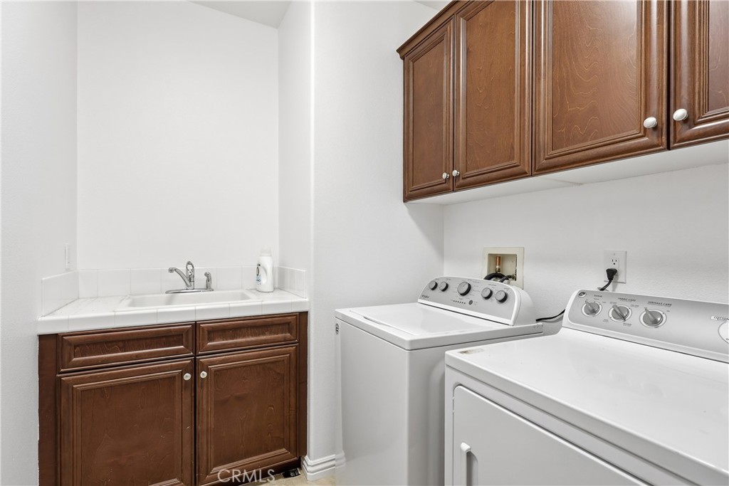 Upstairs laundry room - 1044 Palmetto, Costa Mesa CA 92626 - photo 34