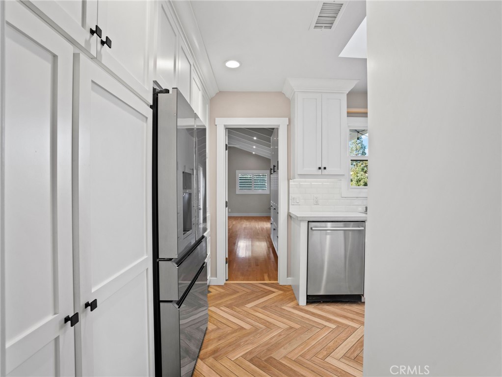 Kitchen to 4th bedroom/family room - 1430 Shamrock, Costa Mesa CA 92626 - photo 21