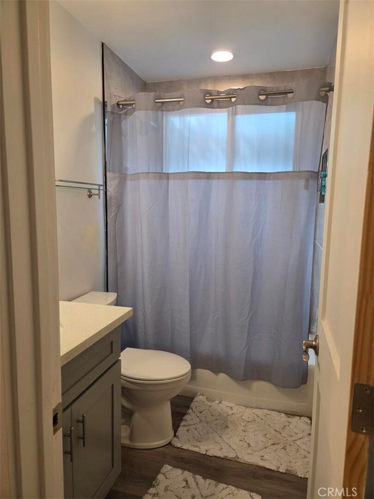 Remodeled guest bath with tub and shower. - 1628 White Oak, Costa Mesa CA 92626 - photo 5