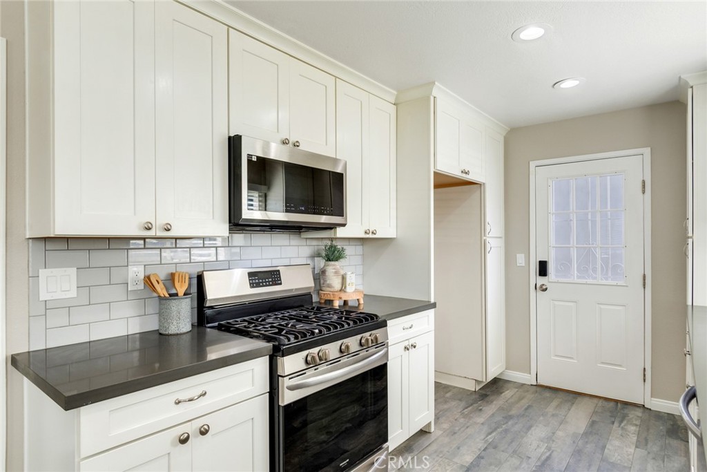 Quartz countertops make this galley kitchen easy to maintain! - 181 Yorktown Lane, Costa Mesa CA 92626 - photo 1