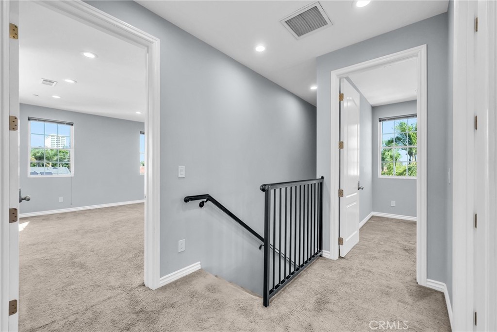 Upstairs view, leading to primary suite - 1810 Pomona, Costa Mesa CA 92627 - photo 17