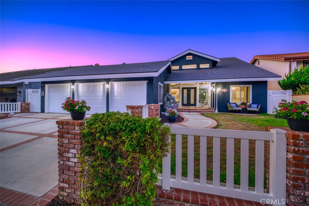 fenced front yard - 1828 Kinglet Court, Costa Mesa CA 92626 - photo 5