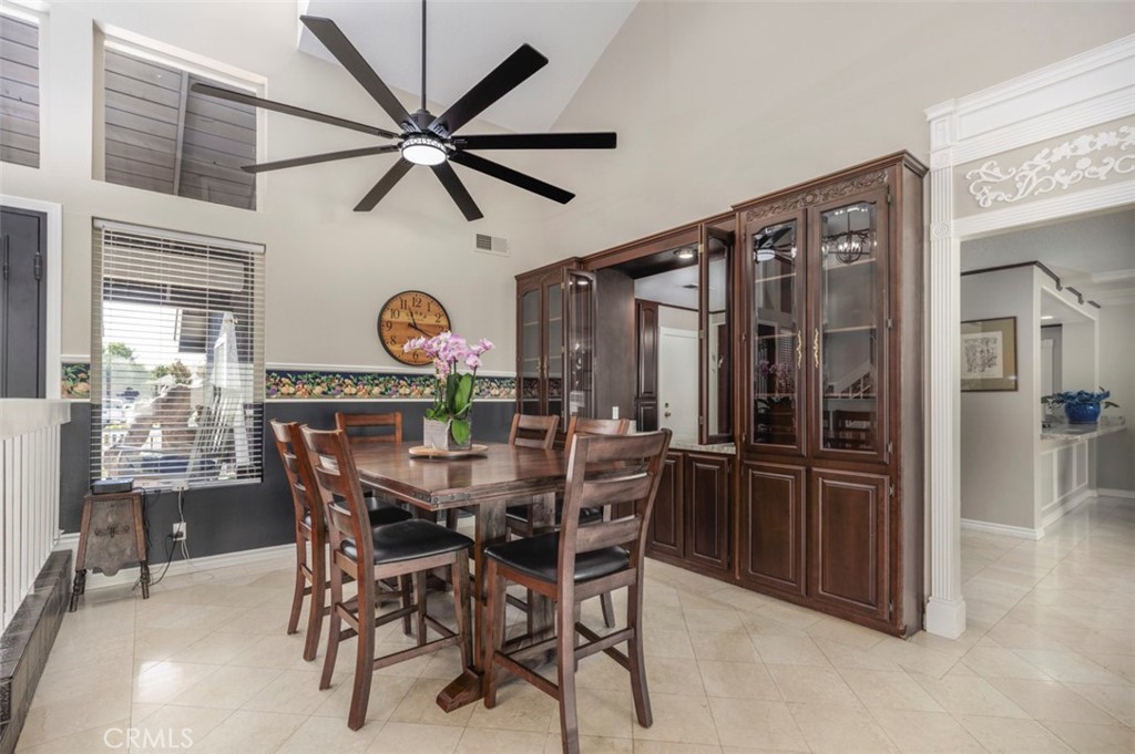 formal dining room with built in china and buffet - 1828 Kinglet Court, Costa Mesa CA 92626 - photo 9
