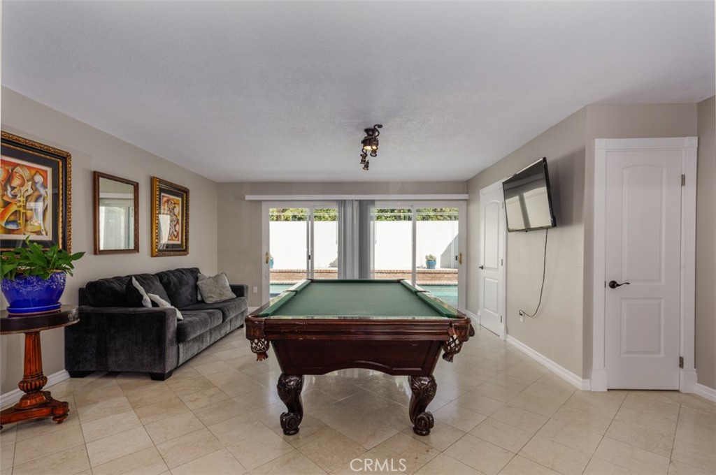ideal entertainers delight spacious living, pool view everyroom - 1828 Kinglet Court, Costa Mesa CA 92626 - photo 10