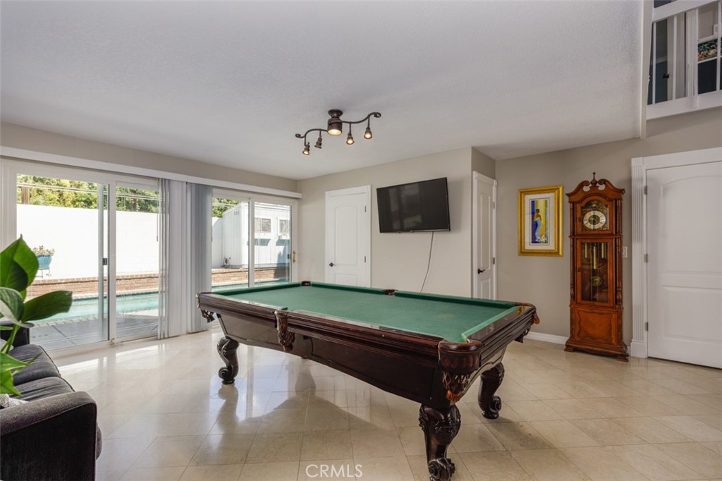 enjoy pool view and access first floor added half bath - 1828 Kinglet Court, Costa Mesa CA 92626 - photo 11