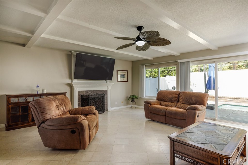 Great room with fireplace - 1828 Kinglet Court, Costa Mesa CA 92626 - photo 17