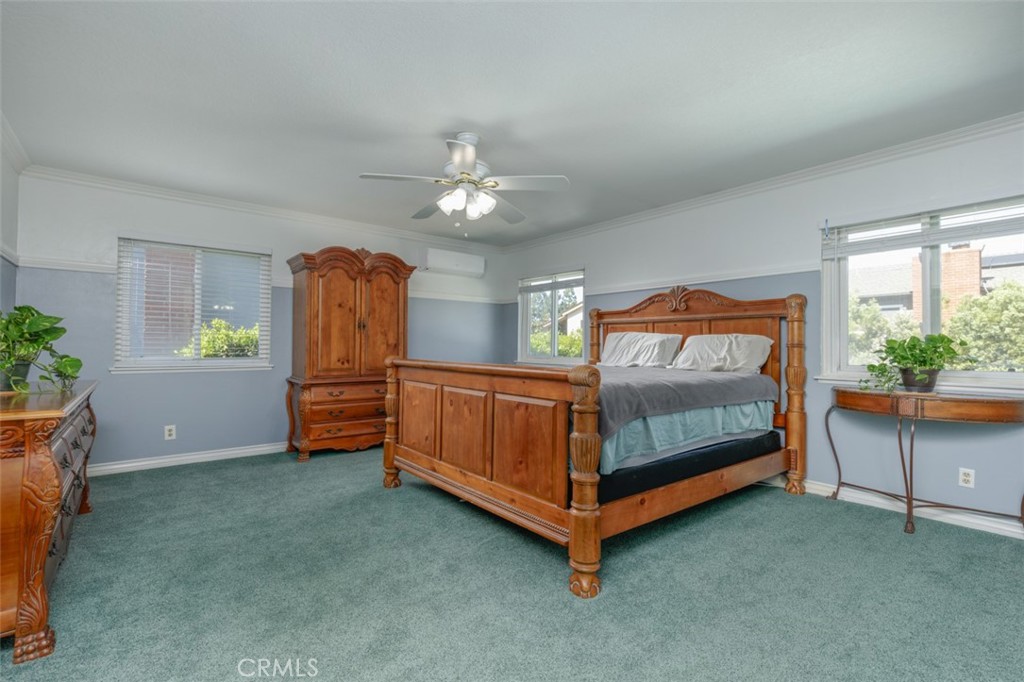 first primary bedroom right - 1828 Kinglet Court, Costa Mesa CA 92626 - photo 20