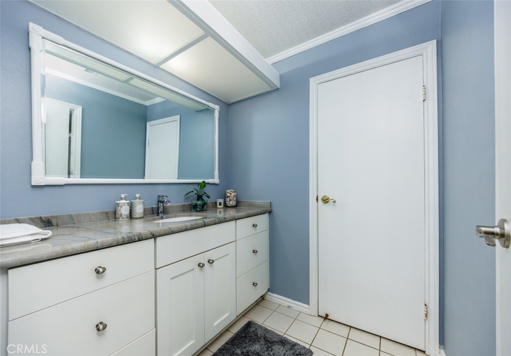 upstairs vanity, jack and Jill - 1828 Kinglet Court, Costa Mesa CA 92626 - photo 27