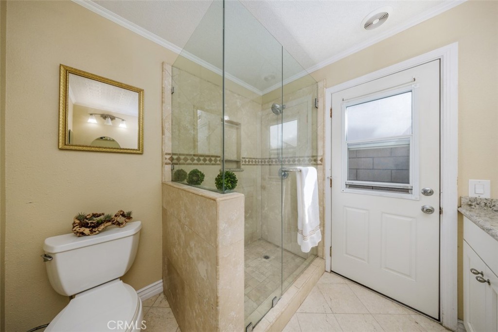 1st floor bath, door to pool - 1828 Kinglet Court, Costa Mesa CA 92626 - photo 35