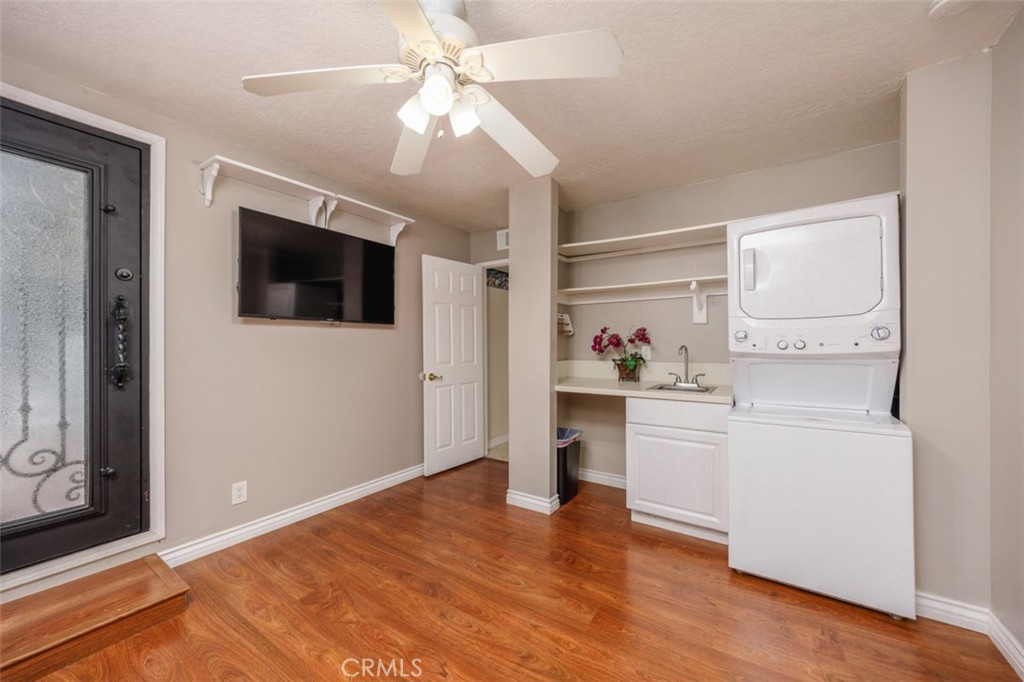 1st floor bed with wet bar and stack wash dryer - 1828 Kinglet Court, Costa Mesa CA 92626 - photo 39