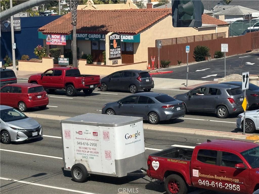 View of a high volume of traffic in front of this building - 1858 Newport, Costa Mesa CA 92627 - photo 3