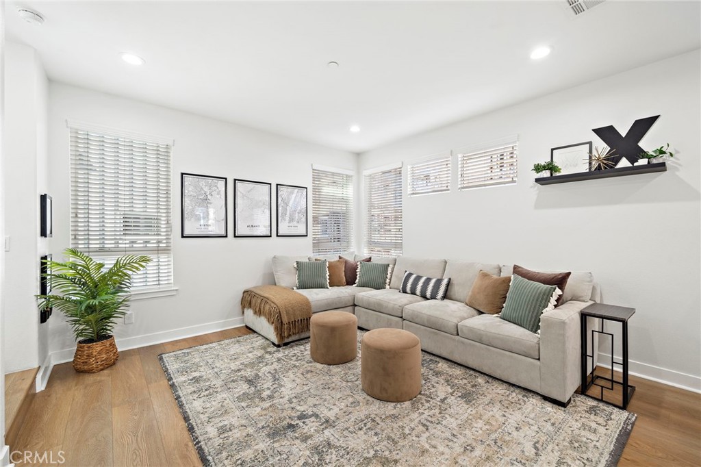 Light-filled open-concept living space highlighted by a spacious living room - 1974 Meyer Place D, Costa Mesa CA 92627 - photo 1