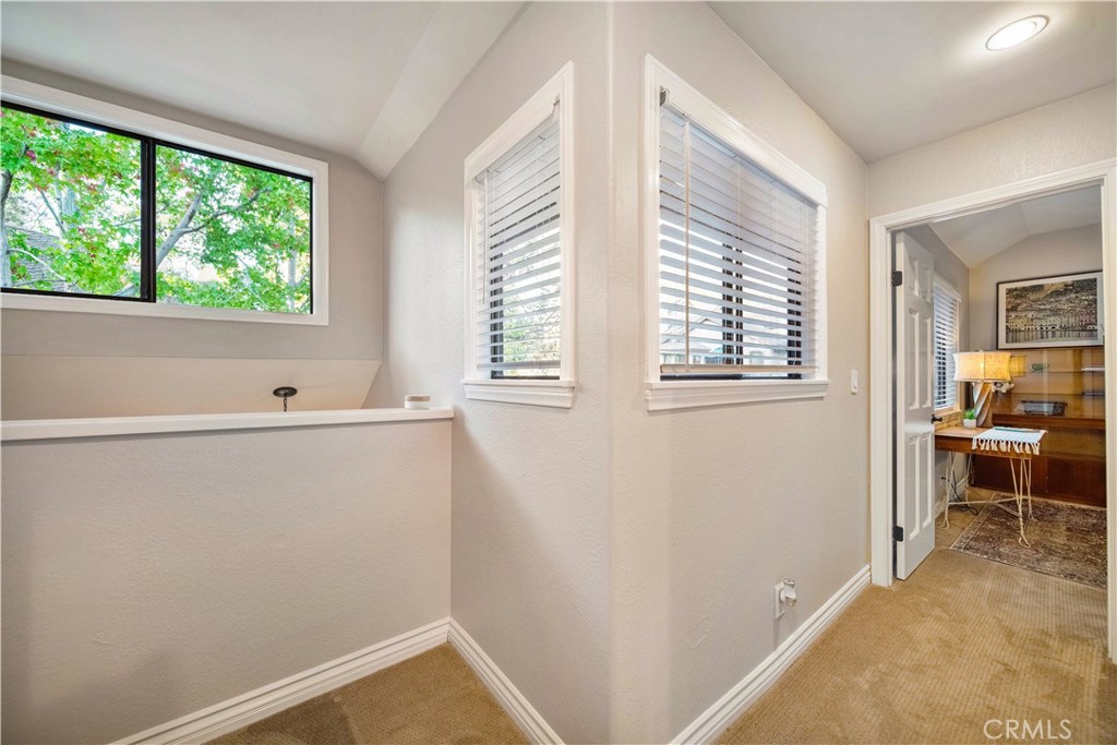 Hallway between dual ensuite bedrooms - 2071 Meadow View Lane, Costa Mesa CA 92627 - photo 24