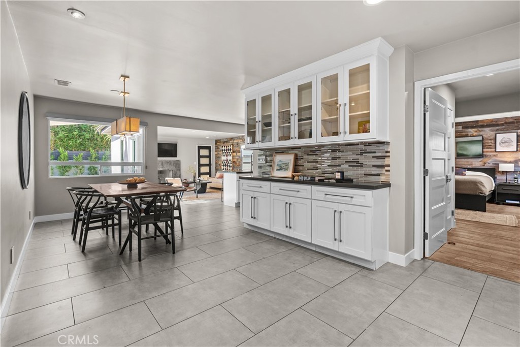 From the front entry looking towards dining, kitchen and living areas. - 2103 Continental, Costa Mesa CA 92627 - photo 2