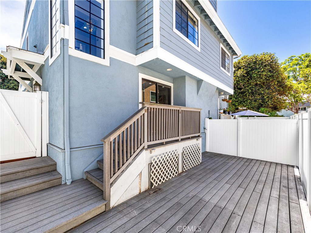 Large private backyard that backs up to a quiet townhouse community, ensuring no noise from apartments, busy streets, or - 212 Mayfair, Costa Mesa CA 92627 - photo 32