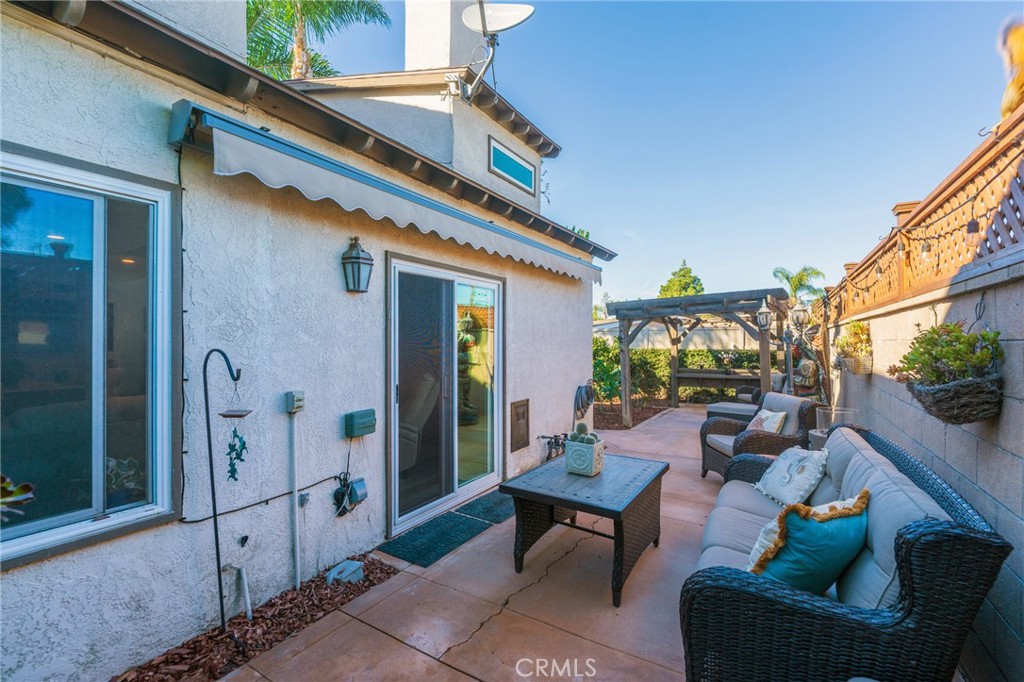 Wrap around sitting area with New Retractable awning - 2168 San Michel E B, Costa Mesa CA 92627 - photo 5