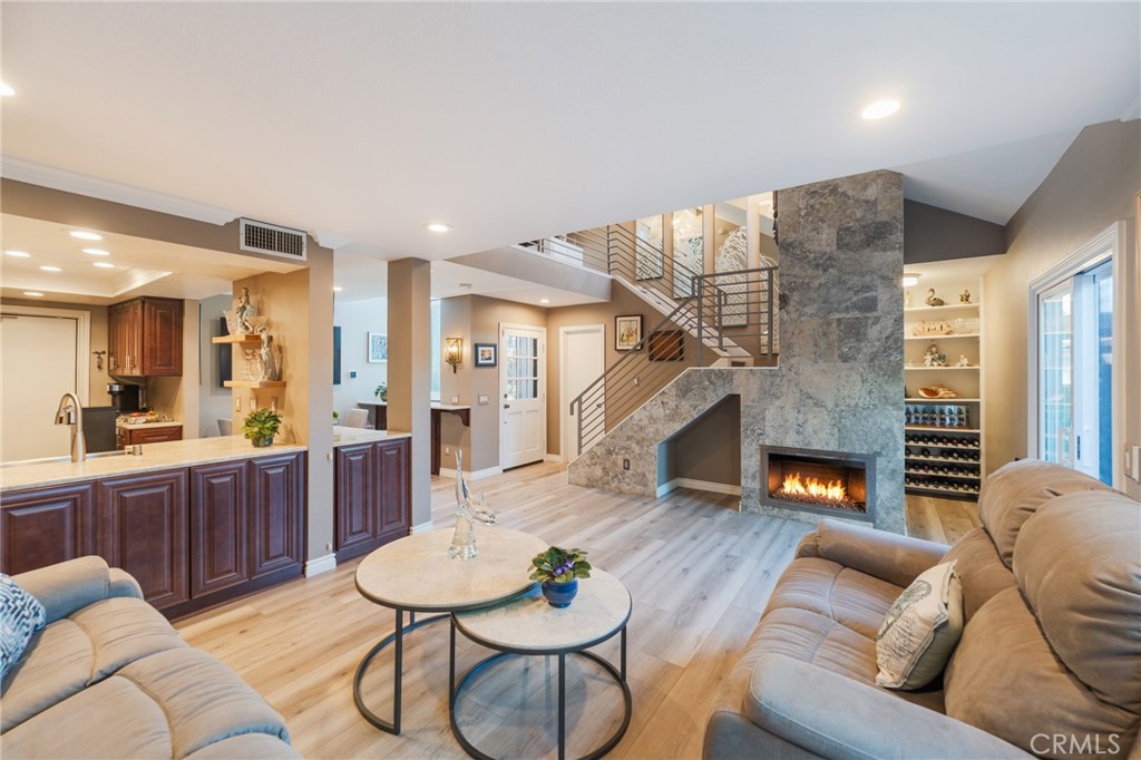 See the secret area behind fireplace could be an office, wine cellar or a small office area! - 2168 San Michel E B, Costa Mesa CA 92627 - photo 7