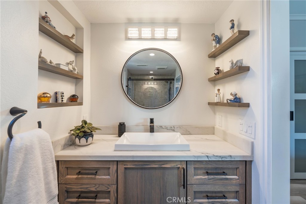 Primary Bathroom with custom cabinet and high end mirror that lights up! - 2168 San Michel E B, Costa Mesa CA 92627 - photo 24