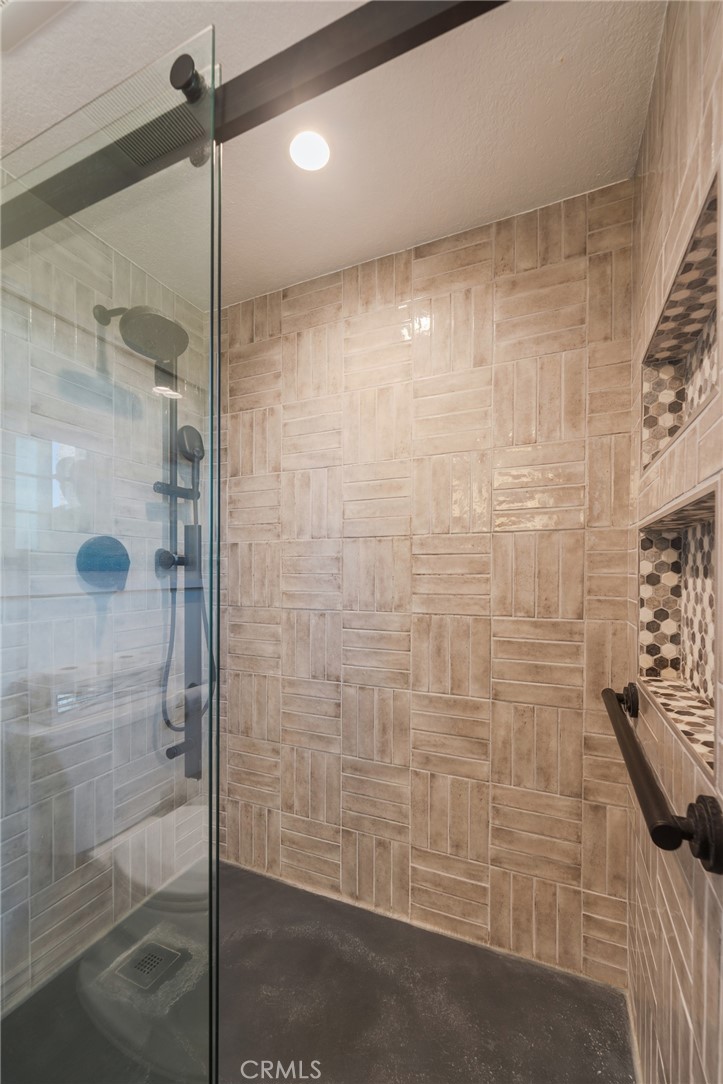 Stunning walk in Shower in Primary bathroom - 2168 San Michel E B, Costa Mesa CA 92627 - photo 25