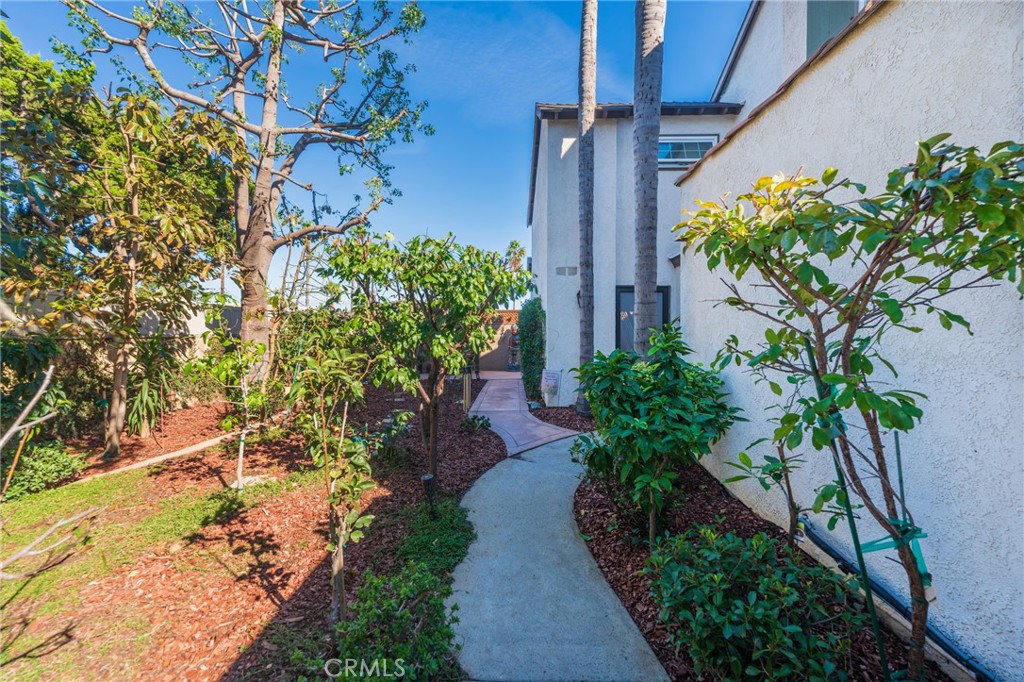 Huge yard area as you walk to your front door - 2168 San Michel E B, Costa Mesa CA 92627 - photo 31