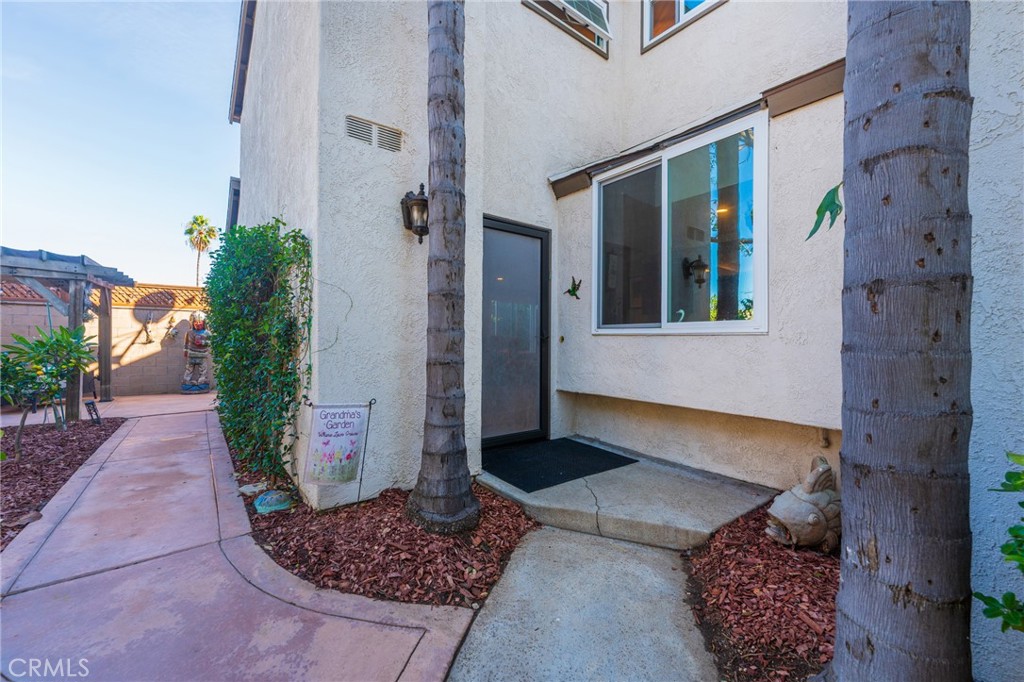 Front door with security screen - 2168 San Michel E B, Costa Mesa CA 92627 - photo 33