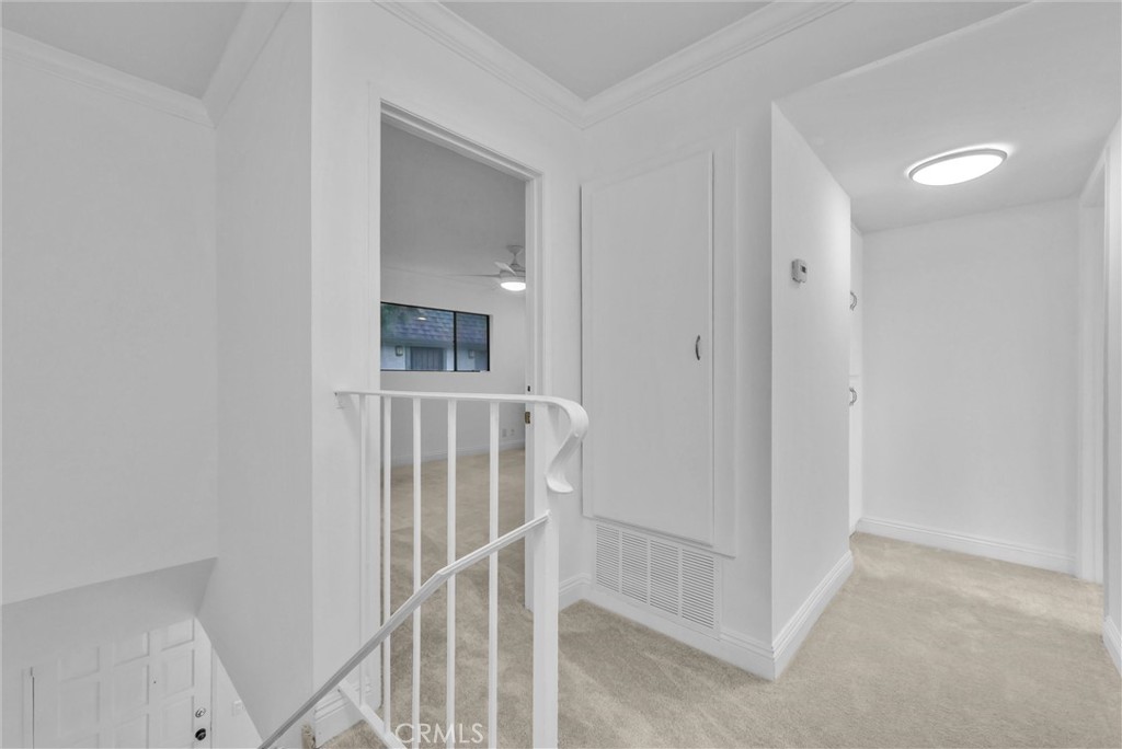 Upstairs hallway - 229 W Wilson Street 10, Costa Mesa CA 92627 - photo 19