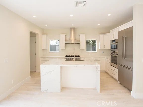 Carrera style waterfall countertop kitchen island - 241 E 19th Street, Costa Mesa CA 92627 - photo 7