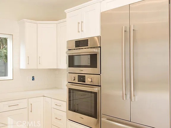 microwave/stove combo and custom refrigerator - 241 E 19th Street, Costa Mesa CA 92627 - photo 11
