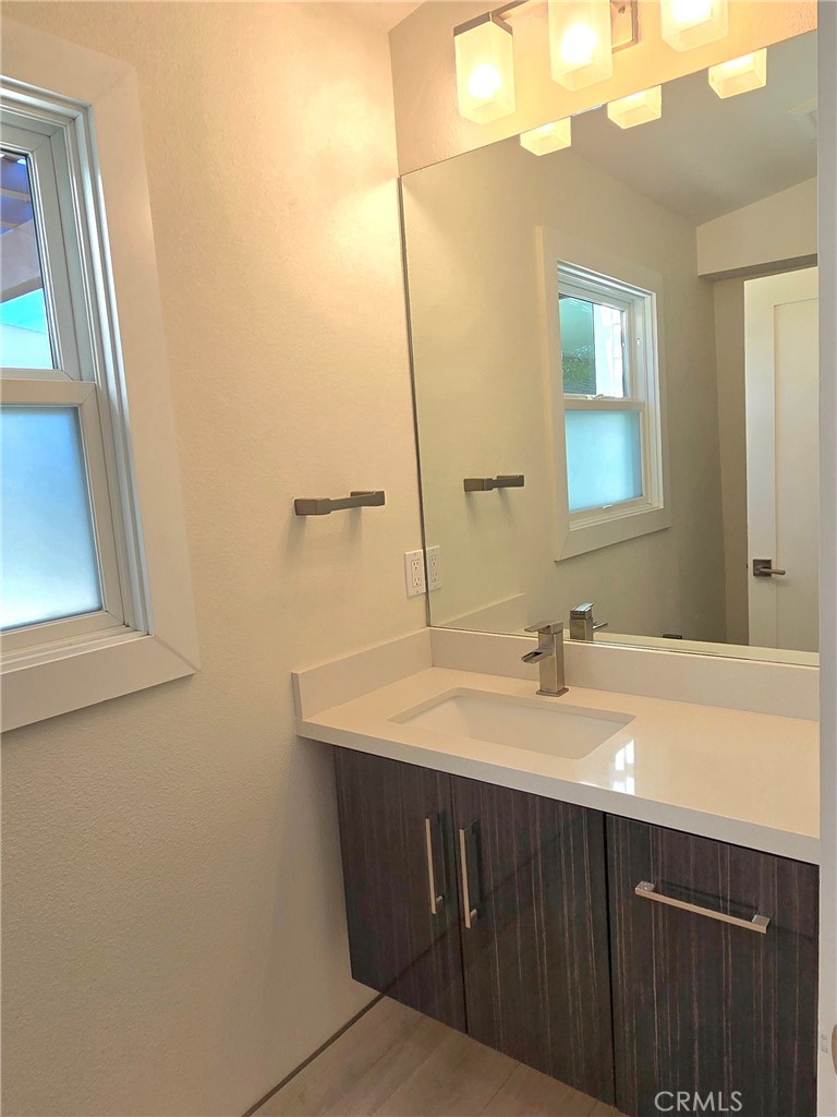 Downstairs powder room - 241 E 19th Street, Costa Mesa CA 92627 - photo 20