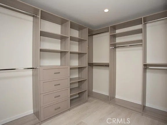 upstairs walk-in closet #1 - 241 E 19th Street, Costa Mesa CA 92627 - photo 29
