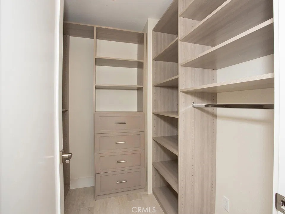 upstairs walk-in closet #2 - 241 E 19th Street, Costa Mesa CA 92627 - photo 30