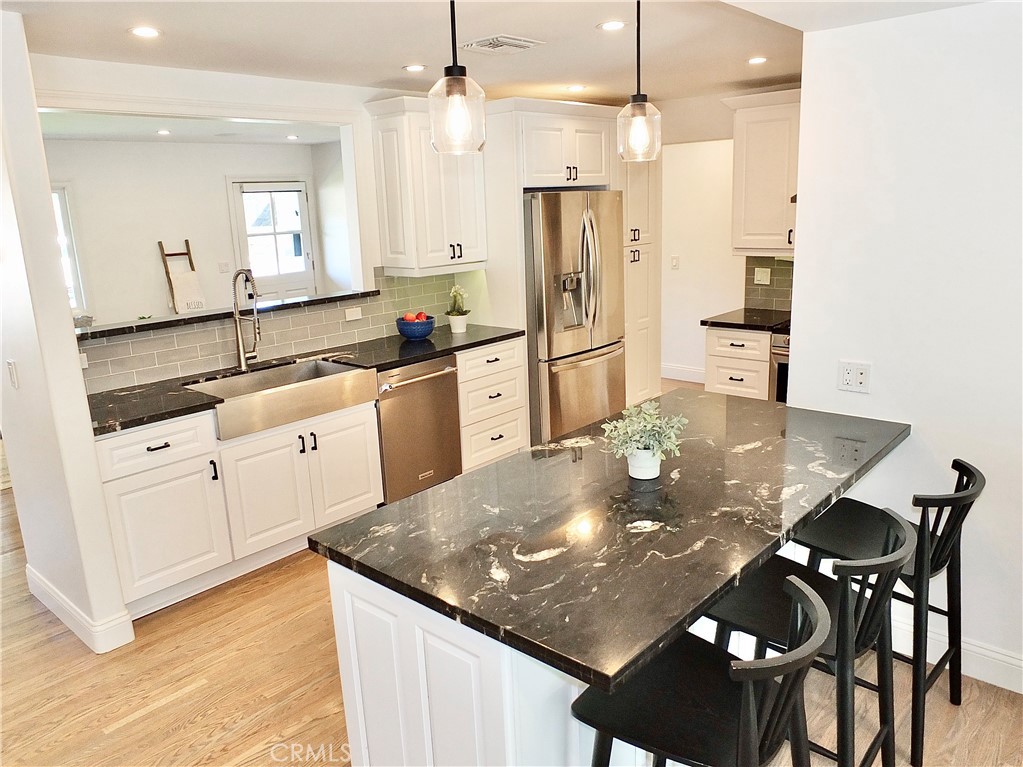 Fabulous kitchen in center of open floor plan - 2443 Fordham, Costa Mesa CA 92626 - photo 1