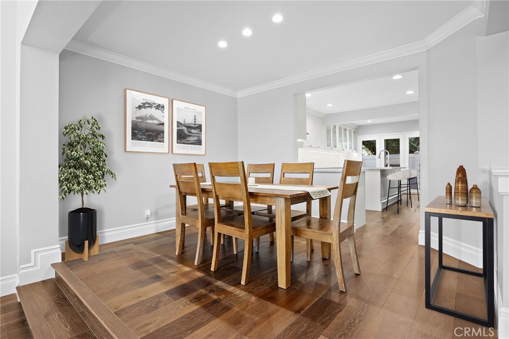 Digitally enchanced with side table, plant and pictures - 2463 Irvine C1, Costa Mesa CA 92627 - photo 6