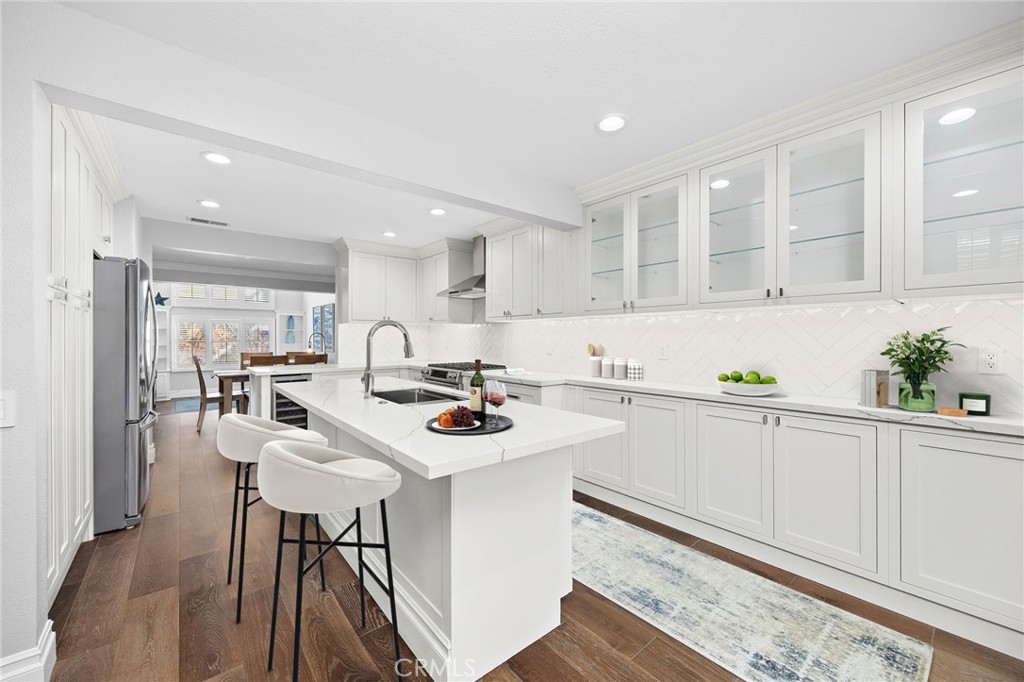 Digitally enchanced with stools and knick knacks - 2463 Irvine C1, Costa Mesa CA 92627 - photo 8