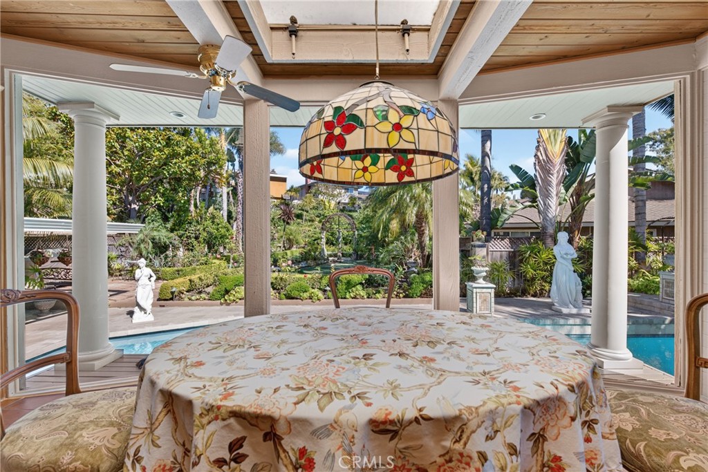 Expanded sunroom/breakfast area overlooking oversized pool & and huge back yard garden organic sanctuary/refuge filled e - 2740 Cardinal Drive, Costa Mesa CA 92626 - photo 22