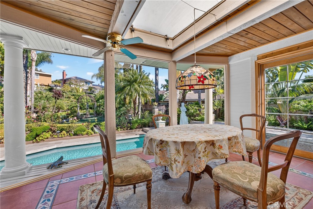 Expanded sunroom/breakfast area overlooking oversized pool & and huge back yard garden organic sanctuary/refuge filled e - 2740 Cardinal Drive, Costa Mesa CA 92626 - photo 23