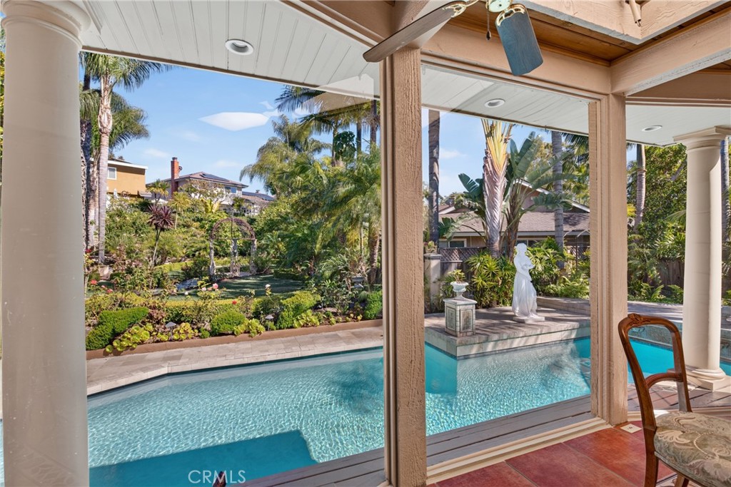 Expanded sunroom/breakfast area overlooking oversized pool & and huge back yard garden organic sanctuary/refuge filled e - 2740 Cardinal Drive, Costa Mesa CA 92626 - photo 25