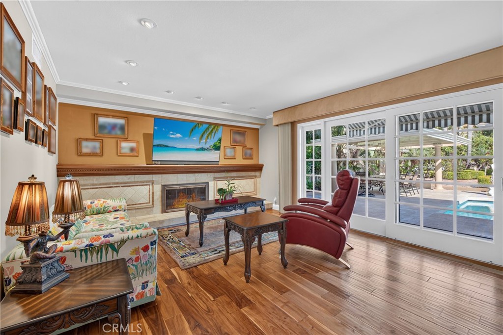 Welcoming family room with fireplace - 2740 Cardinal Drive, Costa Mesa CA 92626 - photo 30